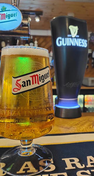 Man holding a pint of cold beer